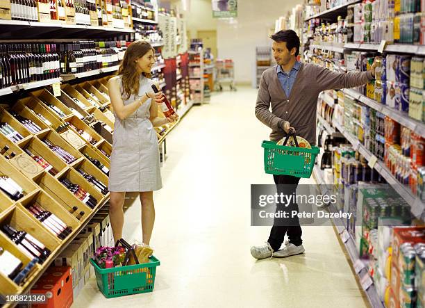 young professionals supermarket dating - two men shopping stock pictures, royalty-free photos & images