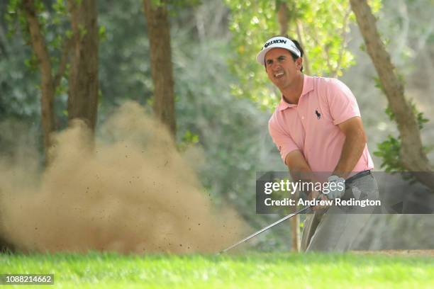 Gonzalo Fernandez-Castano of Spain takes his second shot on hole two from a bunker during Day Two of the Omega Dubai Desert Classic at Emirates Golf...