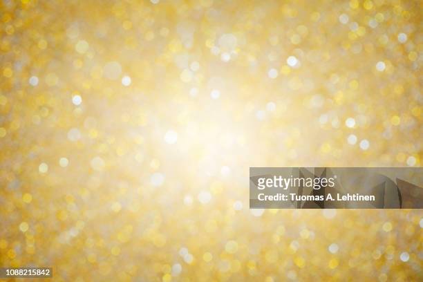 shiny gold bokeh texture background - new year 2018 stock pictures, royalty-free photos & images
