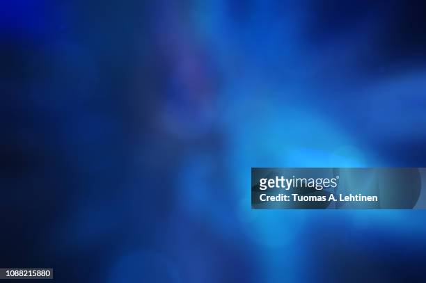 soft and blurred dark blue abstract gradient background with bokeh. - blue abstract background stockfoto's en -beelden