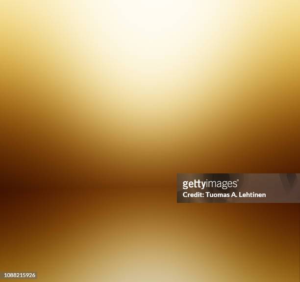 soft and blurred gold and orange colored abstract gradient background with reflection. - gold coloured stock pictures, royalty-free photos & images
