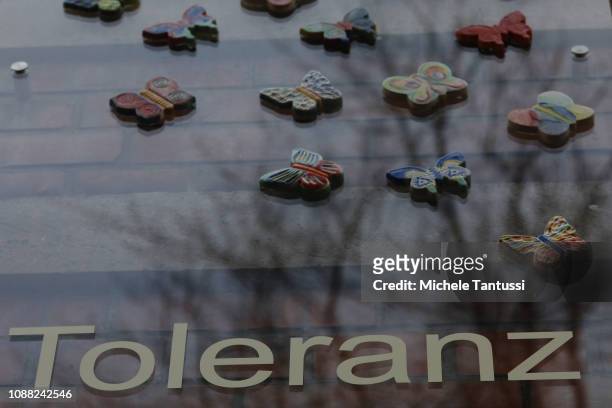The Word Tolerance stands on the memorial of tiles decorated with butterflies dedicated to Jewish children who died in the Holocaust at the Bewegte...
