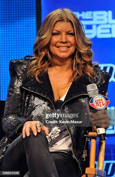 Fergie of the Black Eyed Peas speaks at the Bridgestone Super Bowl XLV Halftime Show press conference on February 3, 2011 in Dallas, Texas.