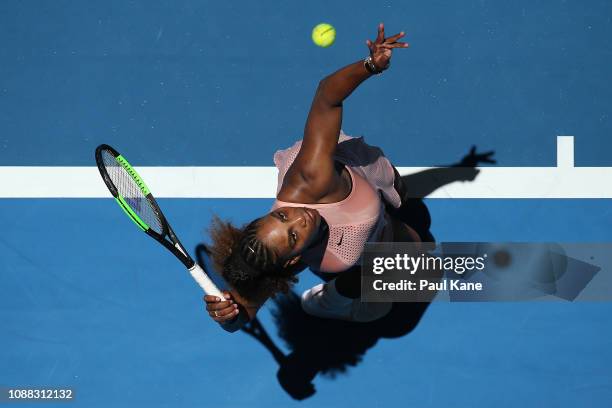 Serena Williams of the United States serves to Maria Sakkari of Greece during day three of the 2019 Hopman Cup at RAC Arena on December 31, 2018 in...