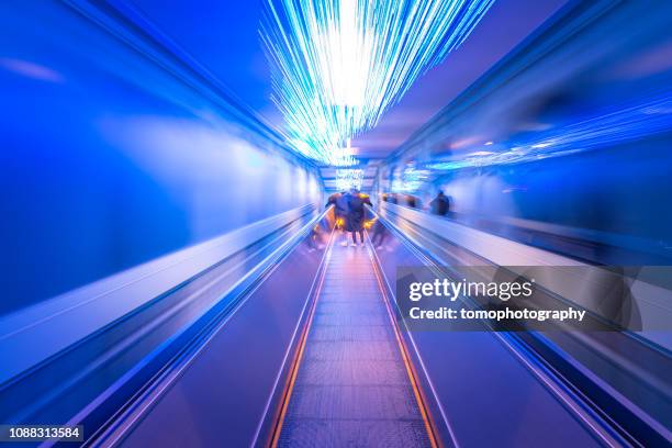 future imate of escalator - lights long exposure stock pictures, royalty-free photos & images