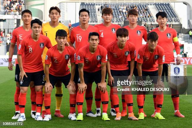 South Korea's midfielder Woo-Young Jung, South Korea's goalkeeper Seung-gyu Kim, South Korea's defender Young-gwon Kim, South Korea's defender Minjae...