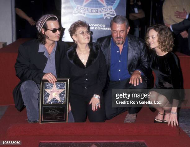 Actor Johnny Depp, mother Betty Sue Wells, father John Depp and girlfriend Vanessa Paradis attend the Hollywood Walk of Fame ceremony to honor Johnny...