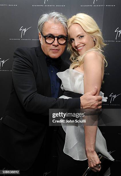 Designer Giuseppe Zanotti and actress Mena Suvari attend the Giuseppe Zanotti Design Beverly Hills Store Opening cocktail reception on February 4,...