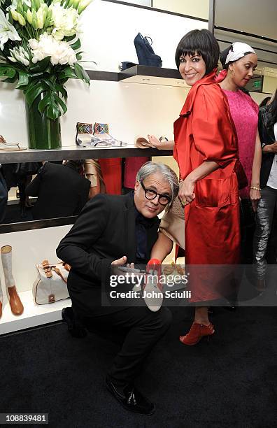 Designer Giuseppe Zanotti and Larissa Sabadash attend the Giuseppe Zanotti Design Beverly Hills Store Opening cocktail reception on February 4, 2011...