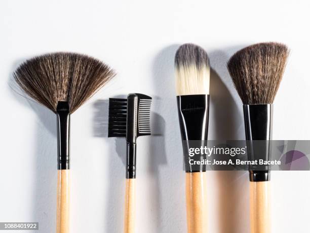 make-up brushes on a white background. - make up brush stock pictures, royalty-free photos & images