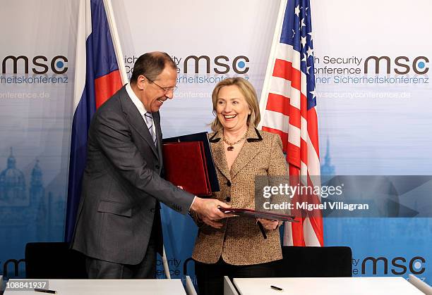 Secretary of State Hillary Clinton and Russian Foreign Minister Sergei Lavrov exchange documents formally bringing into force the landmark nuclear...