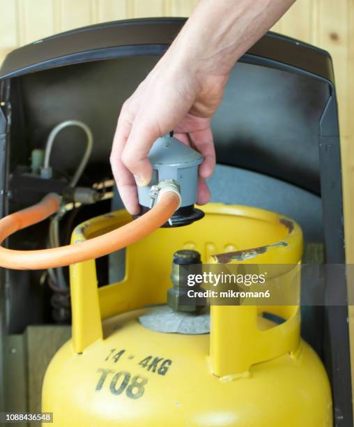 lpg gas bottle, butane gas cylinders - lpg-installation stock pictures, royalty-free photos & images