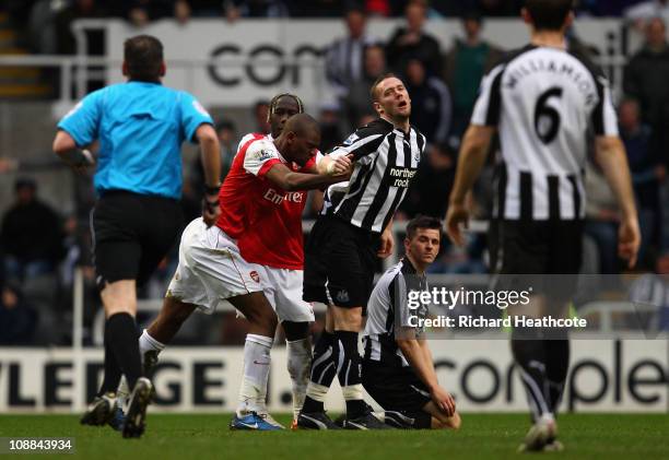 Abou Diaby of Arsenal pushes Kevin Nolan of Newcastle and gets sent off during the Barclays Premier League match between Newcastle United and Arsenal...