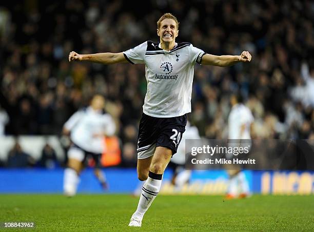 Michael Dawson of Tottenham Hotspur celebrates the winning goal scores by teammate Niko Kranjcar during the Barclays Premier League match between...