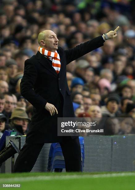 Blackpool manager Ian Holloway shouts instructions to his team during the Barclays Premier League match between Everton and Blackpool at Goodison...