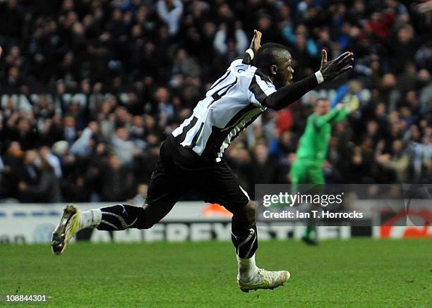 Cheik Tiote of Newcastle United celebrates scoring the equalizing goal during the Barclays Premier league match between Newcastle United and Arsenal...