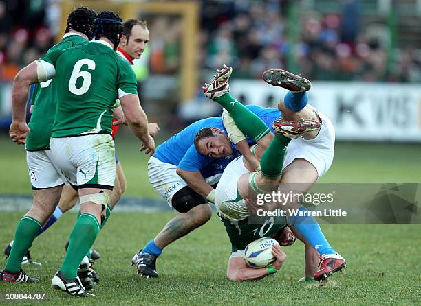 Italian Captain, Sergio Parisse tackles Sean O'Brien of Ireland during the RBS 6 Nations Championships match between Italy and Ireland at Stadio...