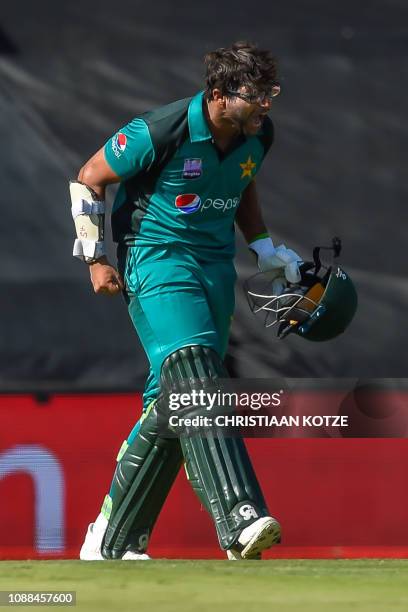 Pakistan's batsman Imam-ul-Haq celebrates as he gets his 100 runs during the third ODI match between South Africa and Pakistan at the Supersport Park...