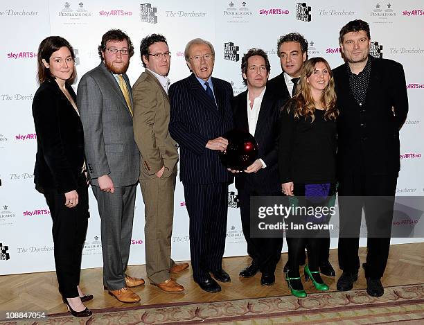 Journalist Sir David Frost poses with the cast and crew of "Rev" in the press room at the South Bank Sky Arts Awards at The Dorchester on January 25,...