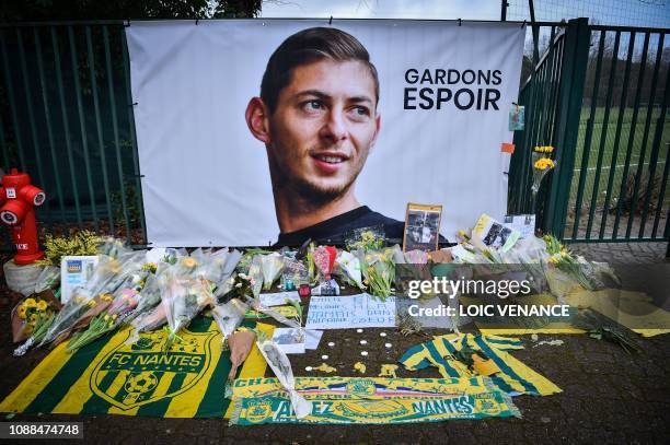 Picture shows flowers put in front of the entrance of the training center La Joneliere in La Chapelle-sur-Erdre on January 25 four days after the...