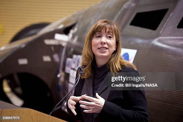 In this photo provided by NASA, NASA Deputy Administrator Lori Garver talks during a press conference with Sierra Nevada's Dream Chaser spacecraft in...