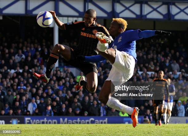 Louis Saha of Everton competes for the ball with Ramires of Chelsea during the FA Cup sponsored by E.On Fourth Round match between Everton and...