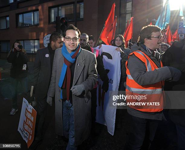 National Union of Students president Aaron Porter stands next to protesters during a march in Manchester to protest against the government's hiking...