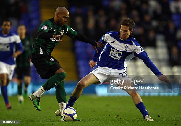 Marlon King of Coventry holds off Alexander Hleb of Birmingham during the FA Cup Sponsored by E.ON 4th Round match between Birmingham City and...