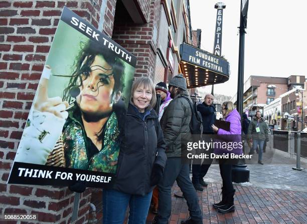 Brenda Jenkyns and Catherine Van Tigem protest the film "Leaving Neverland" screening at the Egeyptian Theatre at the 2019 Sundance Film Festival on...