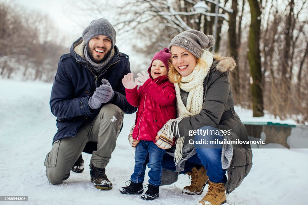 Family enjoying snowy day