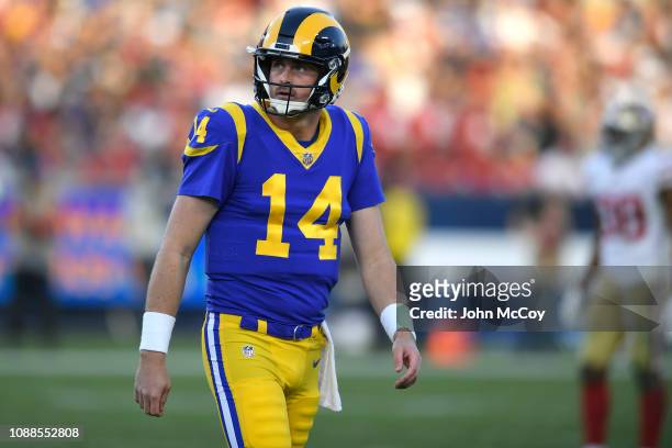 Sean Mannion of the Los Angeles Rams takes the field in the fourth quarter agaisnt the San Francisco 49ers at Los Angeles Memorial Coliseum on...