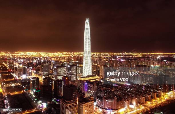 The Tianjin CTF Finance Centre is illuminated to welcome the New Year's Day on December 31, 2018 in Tianjin, China.