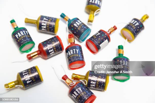 party! - party poppers stock pictures, royalty-free photos & images