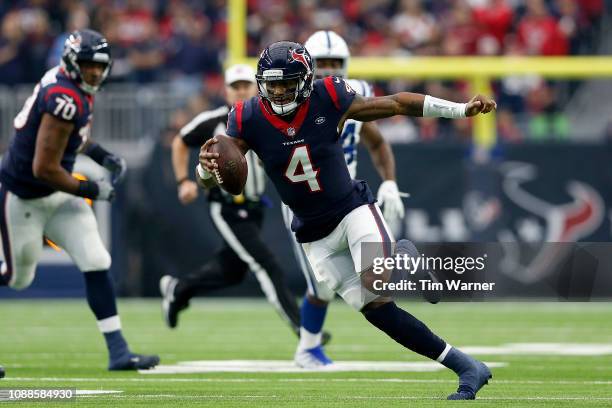 Deshaun Watson of the Houston Texans scrambles in the first half against the Indianapolis Colts at NRG Stadium on December 9, 2018 in Houston, Texas.