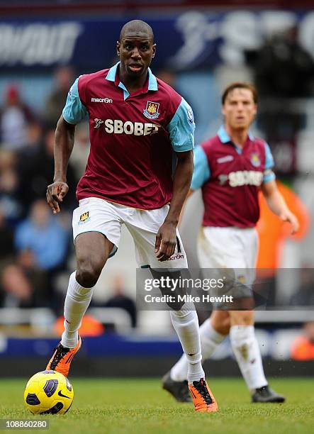 Demba Ba of West Ham United runs with the ball during the Barclays Premier League match between West Ham United and Birmingham City at the Boleyn...