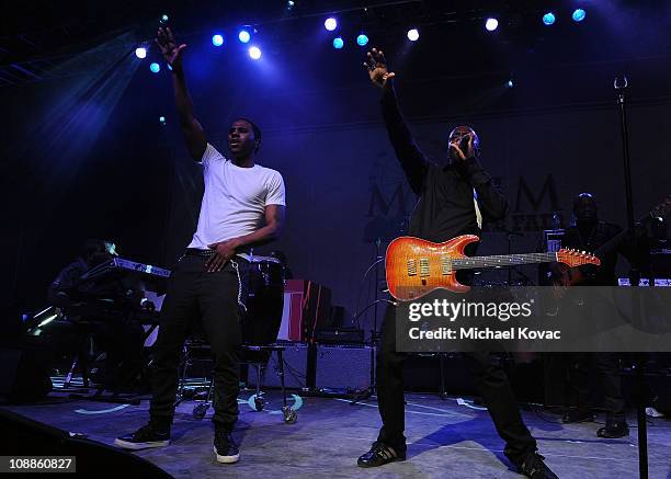 Singer Jason Derulo and musician Wyclef Jean preform with AOL at the Maxim Party Powered by Motorola Xoom at Centennial Hall at Fair Park on February...