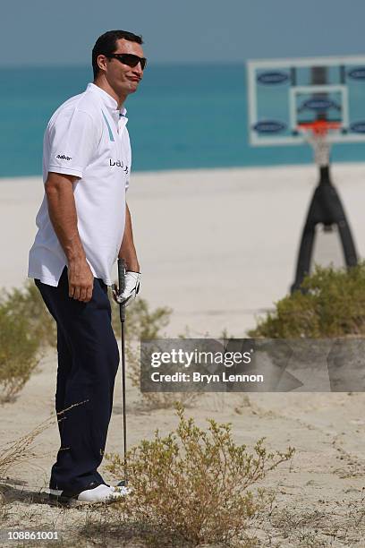 Vladimir Klitschko in action during the Laureus Golf Challenge at the Saadiyat Beach Golf Club part of the 2011 Laureus World Sports Awards on...