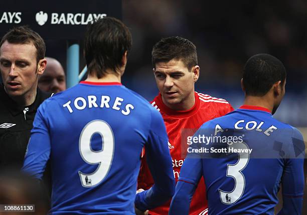 Fernando Torres of Chelsea shakes hands with former team mate Steven Gerrard of Liverpool prior to the Barclays Premier League match between Chelsea...