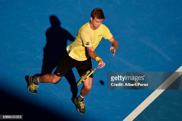 Ryan Harrison of USA plays a forehand in his match against Nick Kyrgios of Australia during day three of the 2019 Brisbane International at Pat...