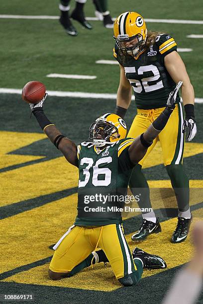 Nick Collins of the Green Bay Packers celebrates after an interception for a touchdown against the Pittsburgh Steelers during Super Bowl XLV at...