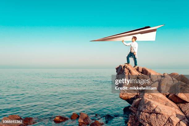 concept of dreaming big and making great inventions like a giant paper plane - streamlined stock pictures, royalty-free photos & images