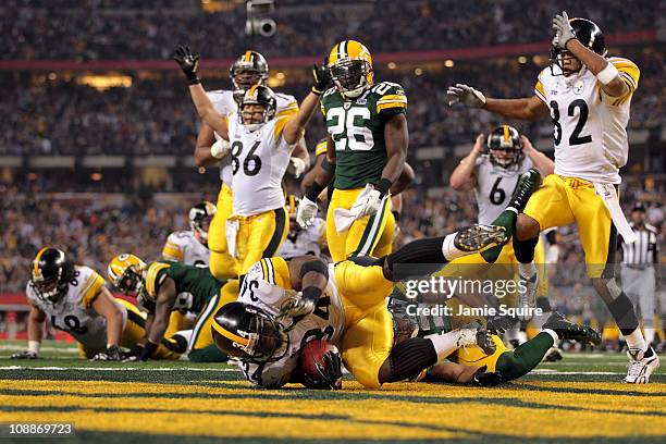 Hines Ward and Antwaan Randle El celebrate as Rashard Mendenhall of the Pittsburgh Steelers runs for an 8 yard touchdown against Pat Lee of the Green...