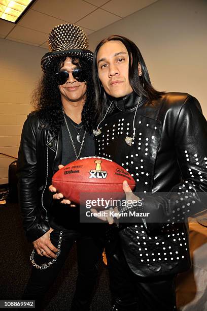 Slash and Taboo of The Black Eyed Peas attend the Bridgestone Super Bowl XLV Halftime Show at Dallas Cowboys Stadium on February 6, 2011 in...