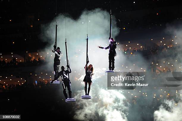 Apl.de.ap, will.i.am, Fergie and Taboo of The Black Eyed Peas perform during the Bridgestone Super Bowl XLV Halftime Show at Dallas Cowboys Stadium...