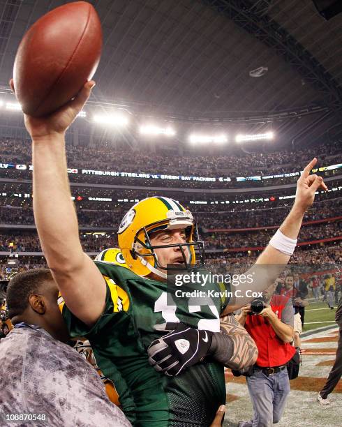 Aaron Rodgers of the Green Bay Packers celebrates after winning Super Bowl XLV against the Pittsburgh Steelers at Cowboys Stadium on February 6, 2011...