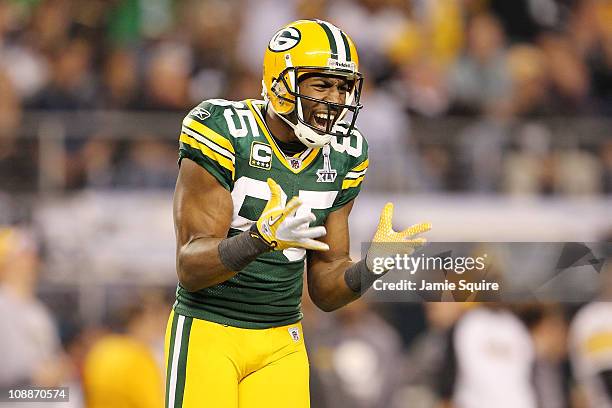 Greg Jennings of the Green Bay Packers celebrates after a first down catch in the fourth quarter during Super Bowl XLV at Cowboys Stadium on February...