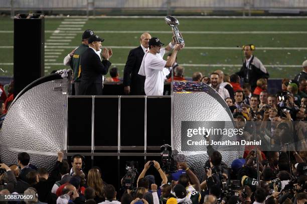 Super Bowl MVP Aaron Rodgers of the Green Bay Packers holds up The Vince Lombardi Trophy after the Green Bay Packers defeated the Pittsburgh Steelers...