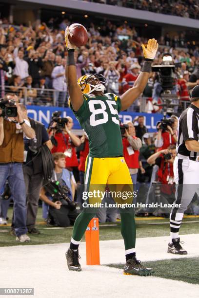 Green Bay Packers wide receiver Greg Jennings celebrates after catching a touchdown pass in the second half in Super Bowl XLV where the Green Bay...