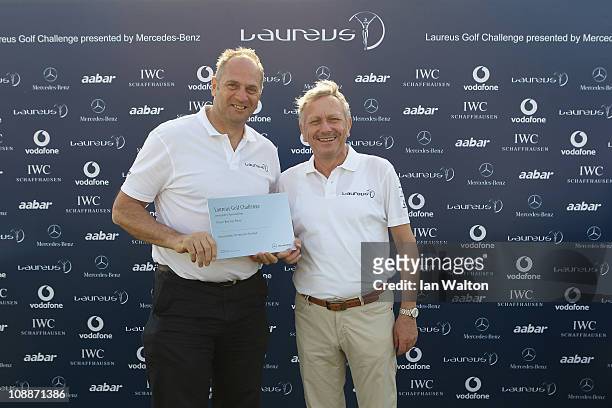 Sir Steve Redgrave and Dr Joachim Schmidt after the Laureus Golf Challenge at the Saadiyat Beach Golf Club part of the 2011 Laureus World Sports...