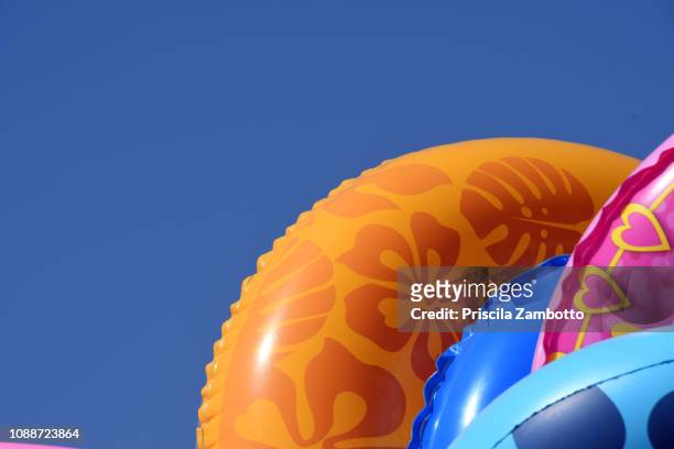 beach buoy - inflatable pool toys imagens e fotografias de stock
